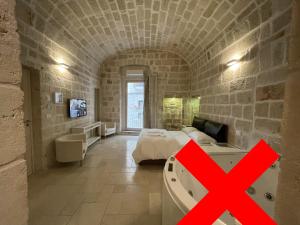 Postel nebo postele na pokoji v ubytování Barbacana46 Guest House