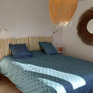 Postel nebo postele na pokoji v ubytování Au gîte des Mazes