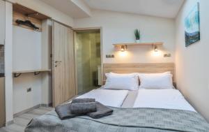 Posteľ alebo postele v izbe v ubytovaní For You Apartmanok