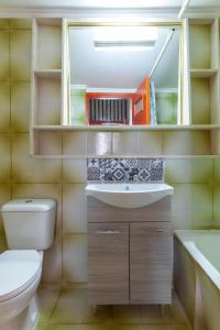 Kúpeľňa v ubytovaní CHAMBRE ORANGE