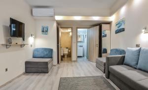 Posedenie v ubytovaní For You Apartmanok