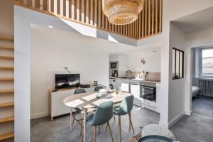 Kuchyň nebo kuchyňský kout v ubytování Le Pommeraye - Coeur de ville