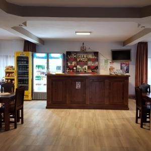 Lounge nebo bar v ubytování Pensiunea Ronicson