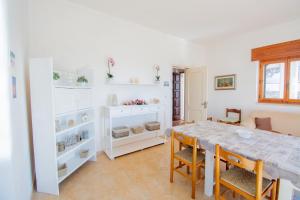 Posteľ alebo postele v izbe v ubytovaní VILLA SALINA MONACI
