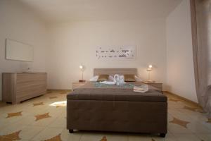 Кровать или кровати в номере VILLA SALINA MONACI
