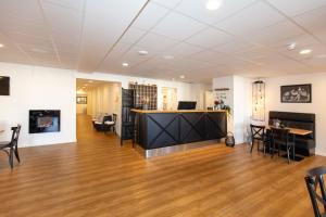 TV a/nebo společenská místnost v ubytování Skagen Hotel