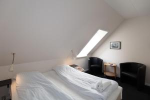 Postel nebo postele na pokoji v ubytování Skråvej Bed & Breakfast