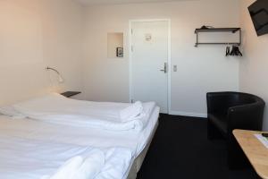 Postel nebo postele na pokoji v ubytování Skråvej Bed & Breakfast