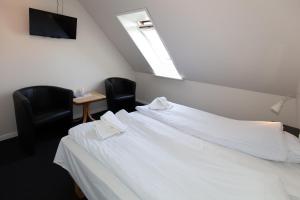 Postel nebo postele na pokoji v ubytování Skråvej Bed & Breakfast