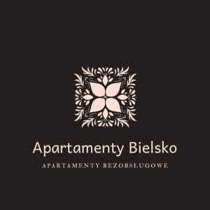 a black and white photo of a clock on a wall at Apartamenty Bielsko na Mickiewicza Bezobsługowy in Bielsko-Biała