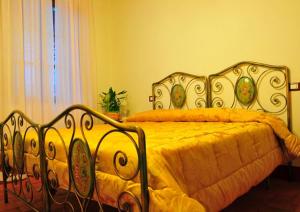 Postel nebo postele na pokoji v ubytování B&B Il Casale di Nanni