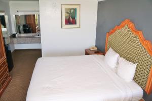 Postel nebo postele na pokoji v ubytování Hotel Elev8