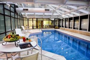 Πισίνα στο ή κοντά στο M N Flats - Flat Dentro Do Hotel WI Avenida Ibirapuera 2927