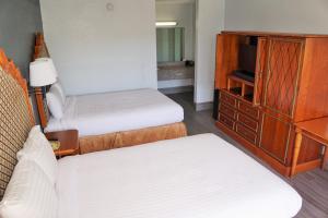 Postel nebo postele na pokoji v ubytování Hotel Elev8