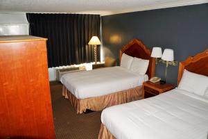 Postel nebo postele na pokoji v ubytování Hotel Elev8