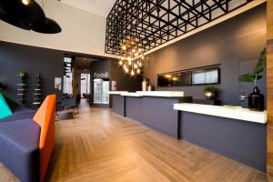 The lobby or reception area at Mercure Sao Bernardo Do Campo