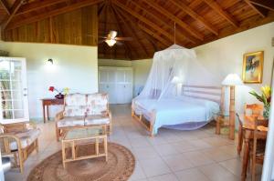 Postel nebo postele na pokoji v ubytování Pimento Lodge Resort + 37 fotografií