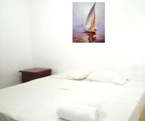 Letto o letti in una camera di Hotel Doral