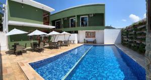 Swimming pool sa o malapit sa Hotel Cajueiro Guarujá