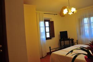Postel nebo postele na pokoji v ubytování B&B Il Casale di Nanni
