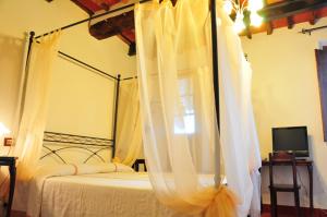 Postel nebo postele na pokoji v ubytování B&B Il Casale di Nanni