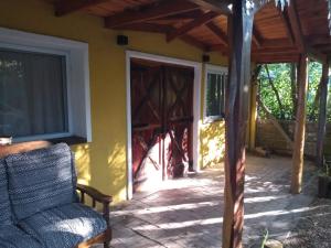 an open door to a house with a patio at Casa de Campo La Renata in El Pato