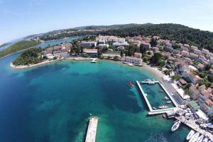 an aerial view of a small island in a body of water at Apartments Mir - perfect location & cosy in Korčula