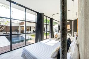 Ένα ή περισσότερα κρεβάτια σε δωμάτιο στο Rouge - Loft Mango +36 φωτογραφίες