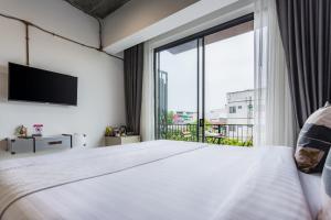THE WOOD客房内的一张或多张床位