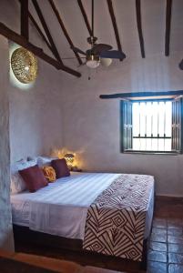 Postel nebo postele na pokoji v ubytování La Loma Hotel Barichara + 37 fotografií