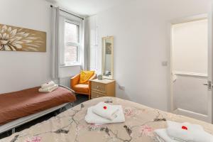 En eller flere senge i et værelse på 44 Stonehill Street