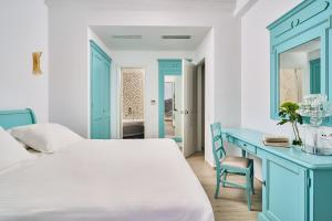 Кровать или кровати в номере Arte & Mare Elia Luxury Suites and Villas