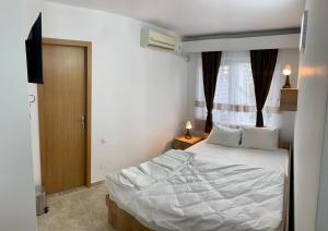 Postel nebo postele na pokoji v ubytování Hostel JAZ