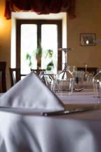 Postel nebo postele na pokoji v ubytování Hotel Alla Corte dei Bicchi