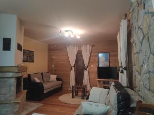 Prostor za sedenje u objektu Apartment Isidora