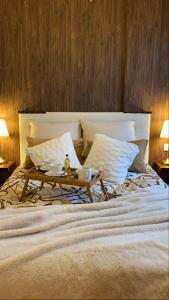 A bed or beds in a room at Apartamentos A Poniente