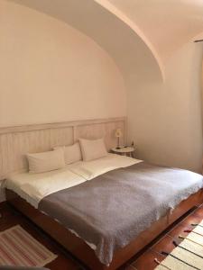 Ένα ή περισσότερα κρεβάτια σε δωμάτιο στο Penzion u Svatého Prokopa