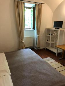 Ένα ή περισσότερα κρεβάτια σε δωμάτιο στο Penzion u Svatého Prokopa +16 φωτογραφίες