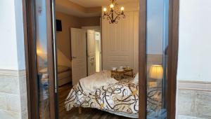 A bed or beds in a room at Apartamentos A Poniente