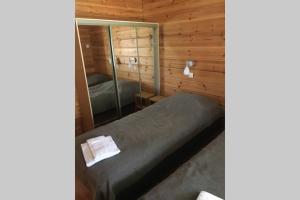 Postel nebo postele na pokoji v ubytování Vierumäki + 28 fotografií