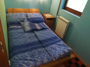 Voodi või voodid majutusasutuse Apartmani Popovic toas