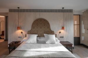 Posteľ alebo postele v izbe v ubytovaní Parador de Turismo de León