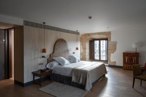 Posteľ alebo postele v izbe v ubytovaní Parador de Turismo de León