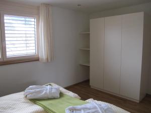 Letto o letti in una camera di Haus Kibitz