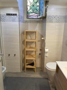 Een badkamer bij Alex Rhome Apartment