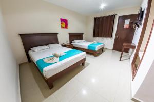 Кровать или кровати в номере Hotel Villamar