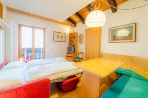 Llit o llits en una habitació de Dolomites Dream Marmolada