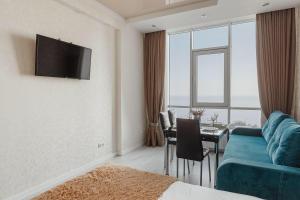 Et tv og/eller underholdning på Apartments Arcadia Panorama of the sea