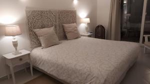 Katil atau katil-katil dalam bilik di Three Palms Apartment