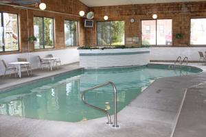The swimming pool at or close to Budget Host Inn & Suites
